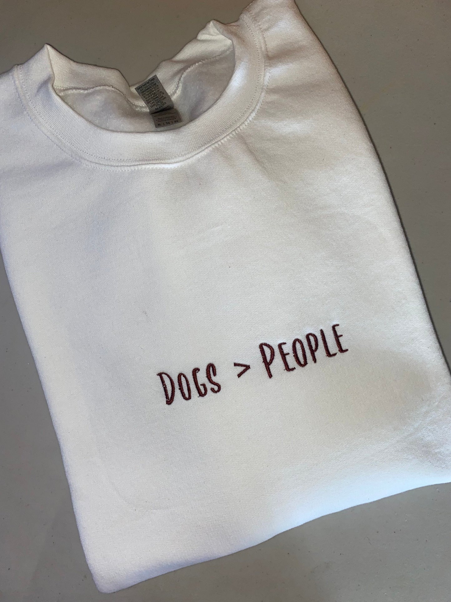 Dogs over people embroidered sweatshirt