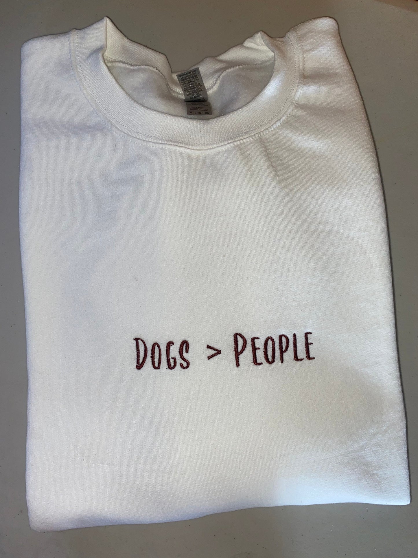 Dogs over people embroidered sweatshirt